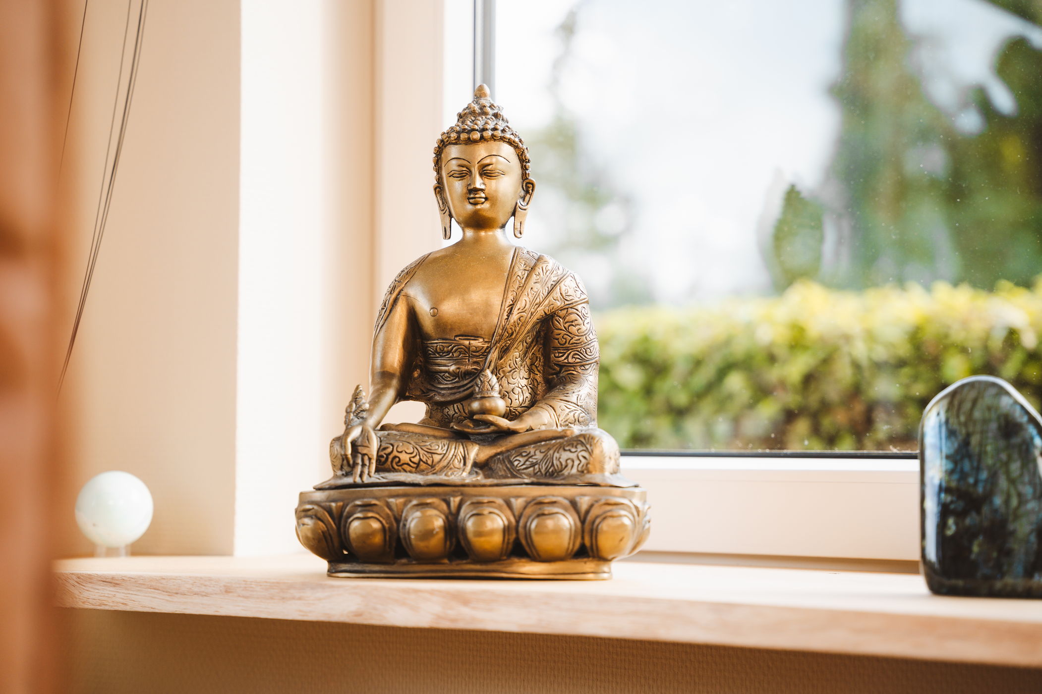 buddha beeldje - Migraine Specialist